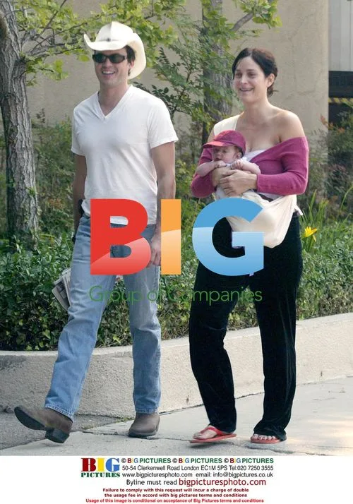 MATRIX ACTRESS CARRIE ANN MOSS OUT WITH FAMILY