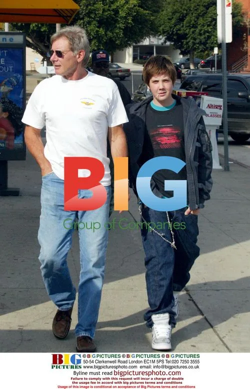 Harrison Ford and son leaving restaurant