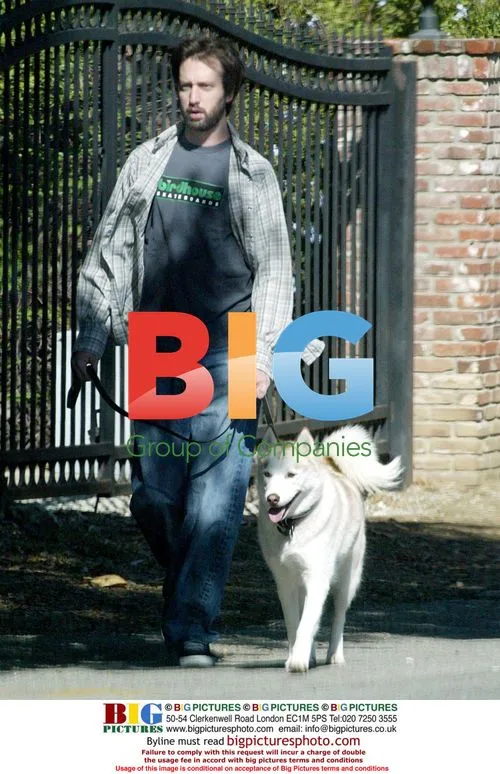Tom Green walking his dog