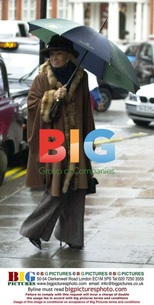 Roger Moore and Wife Christina Out in London
