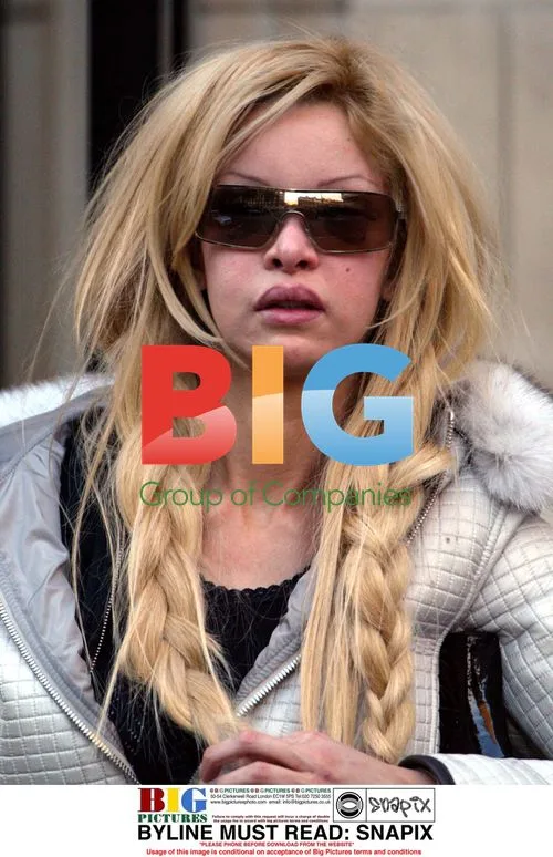 Alicia Douvall has a bad hair day in London