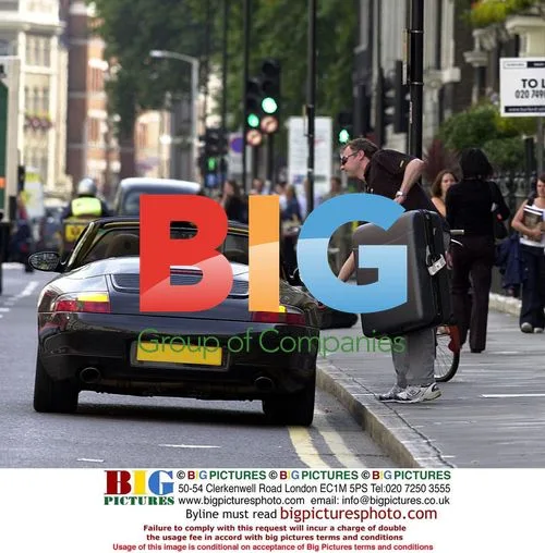 John Leslie and Abby Titmus Seen Arguing in London