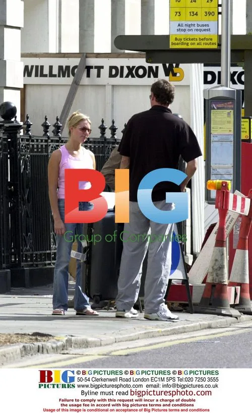 John Leslie and Abby Titmus Argue Outside London Flat