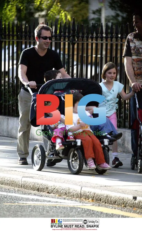 Ben Elton with family on London walk