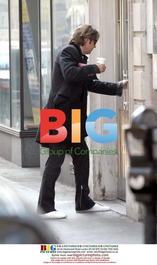 Jonathan Ross Grabs Coffee in Soho, London