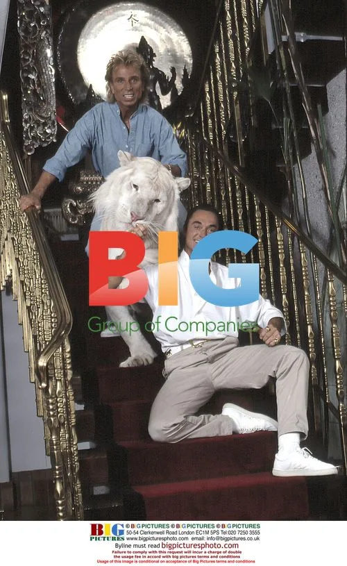 Siegfried and Roy with white tigers