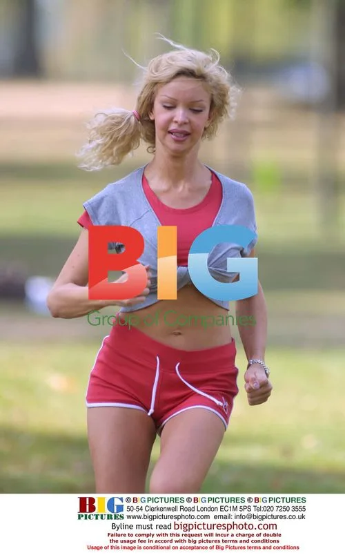Alicia Douvall Exercising in London Park