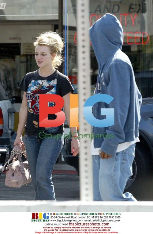 Britney Spears at airport with boyfriend