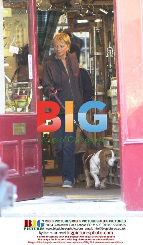 DJ Sara Cox and companion out in North London
