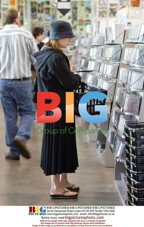 Winona Ryder shopping at record store