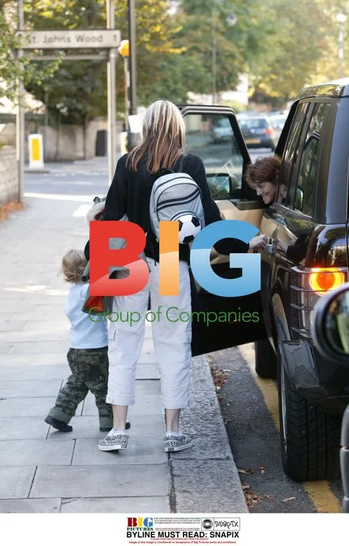 Nicole Appleton Picks Up Son Gene