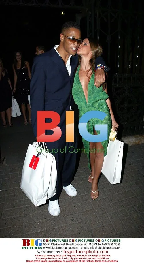 Singer Romeo Dunn and girlfriend Tania at charity ball