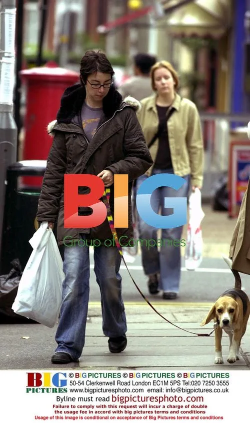TV presenter Sue Perkins walks her dog Oscar