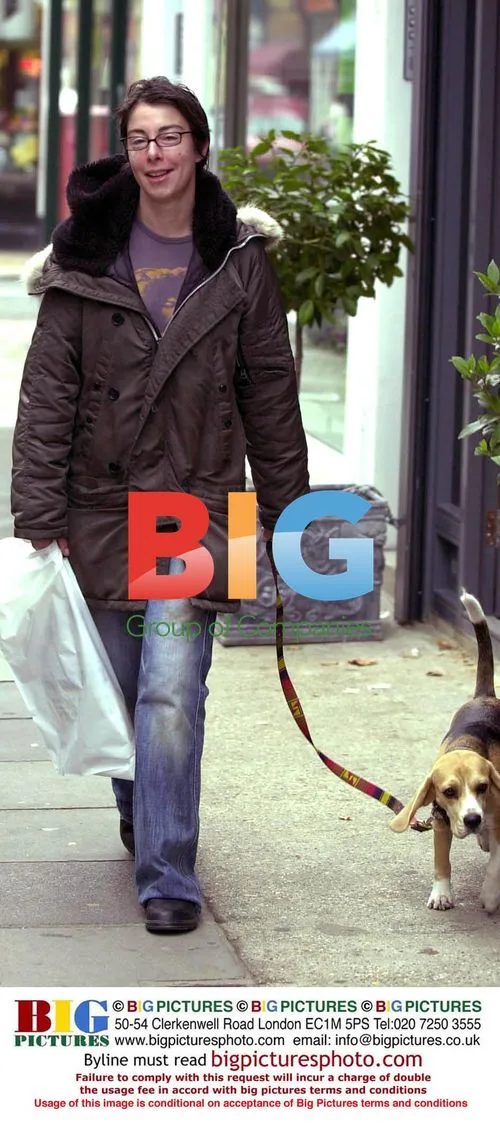 Sue Perkins walking her dog 'Oscar'