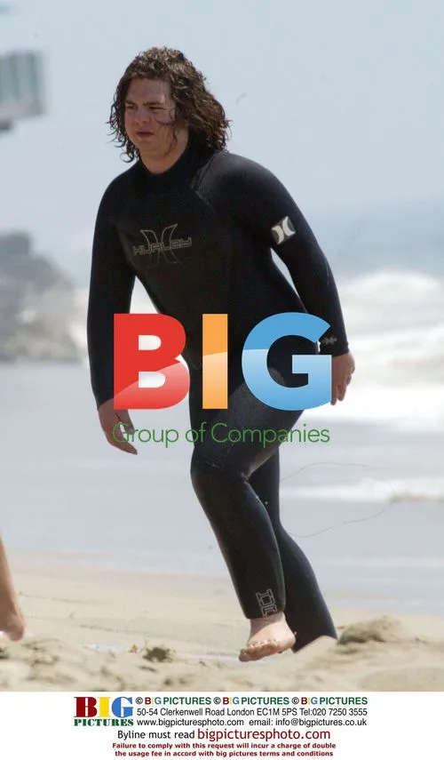 Jack Osbourne swims in front of Malibu home
