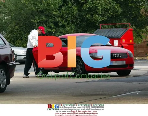 Jack Ryder with dented Audi TT at petrol station