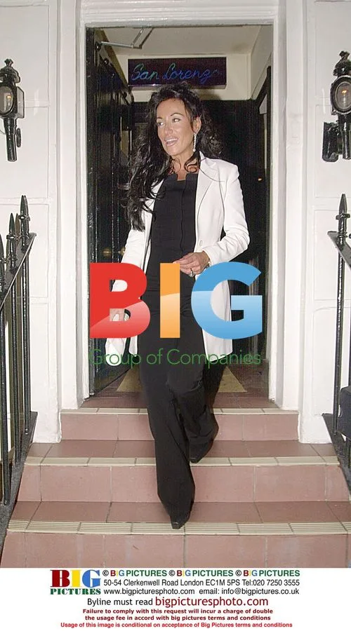 Nancy Dell'olio leaving restaurant with Sven Eriksson