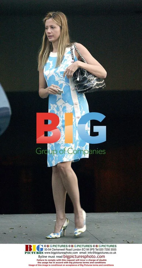 Mira Sorvino shopping with boyfriend