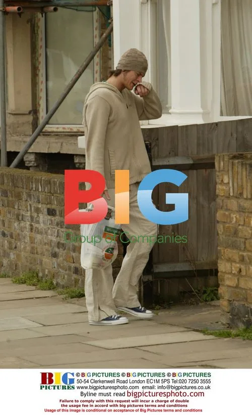 Lucy Benjamin and boyfriend arrive at flat