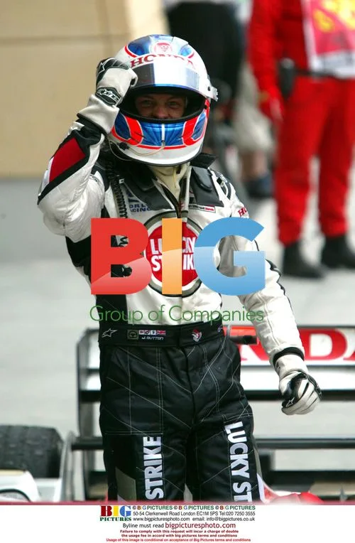 Jenson Button celebrates 3rd place in Bahrain