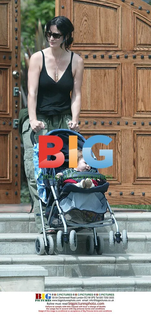 Carrie Anne Moss with Baby in LA