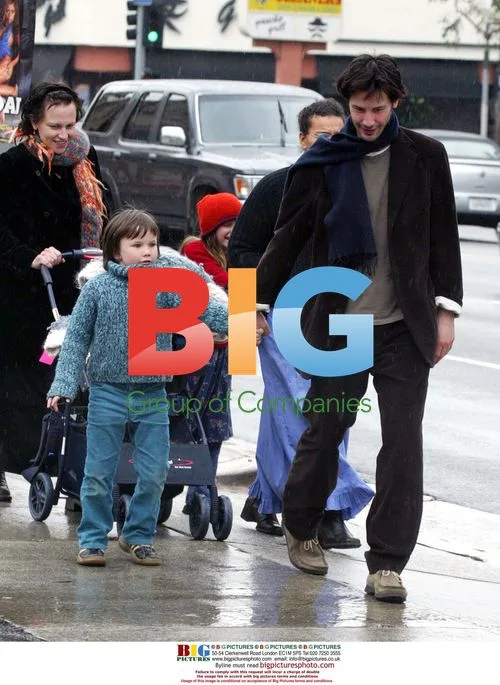 Keanu Reeves with Niece in Rain