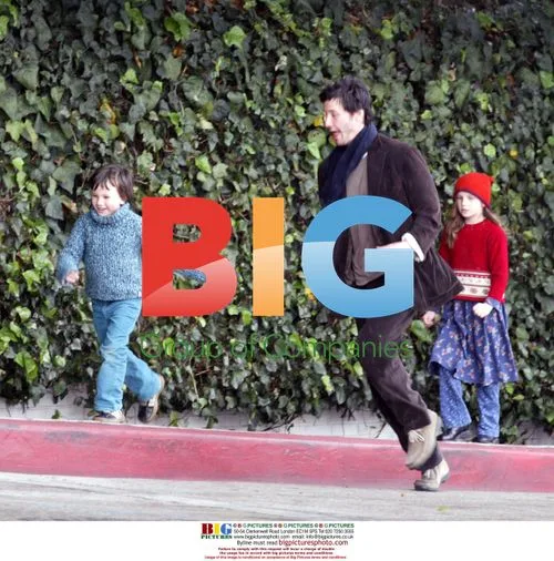 Keanu Reeves and Niece Dodge Raindrops