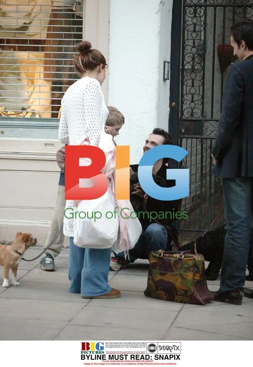 Sienna Miller in London with Jude Law and son