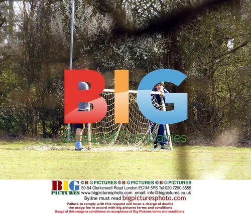 Robbie Williams and Jonathan Wilkes Kick Football