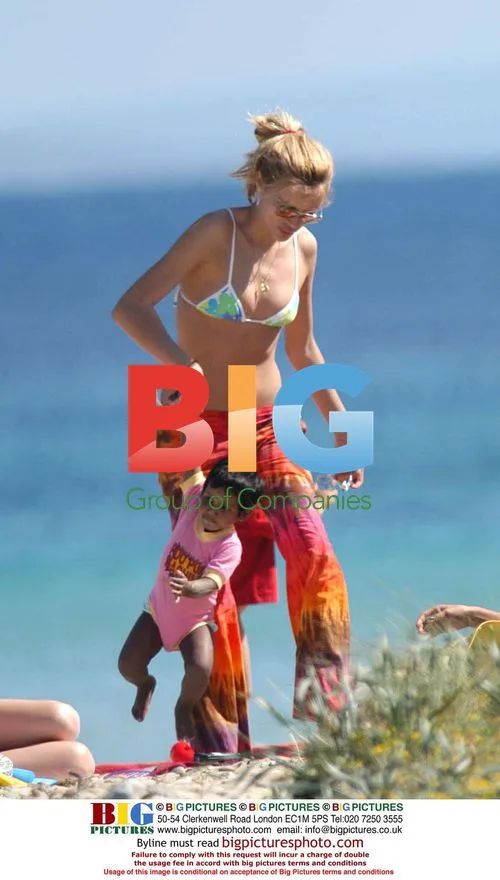 Spanish model Esther Caadas with adopted daughter in Ibiza