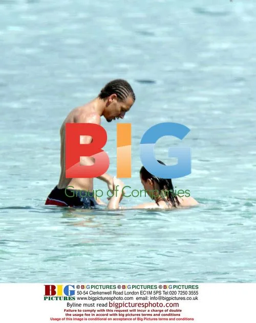 Rio Ferdanand and Girlfriend on Beach