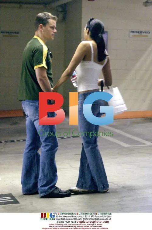 Matt Damon and Luciana Boroza in parking lot