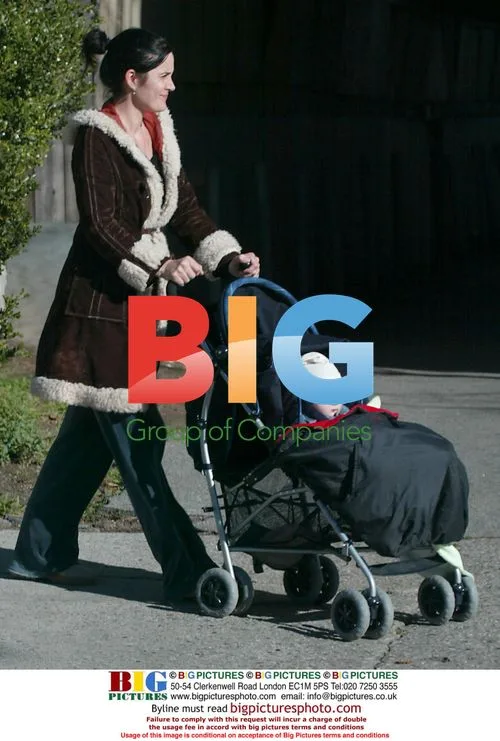 Carrie-Anne Moss out with baby in LA