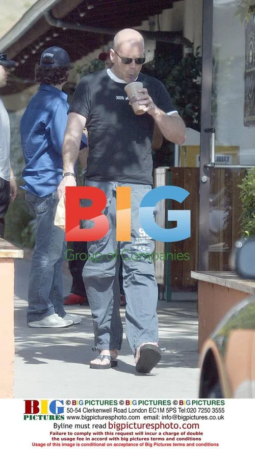 Bruce Willis Gets Iced Coffee in Malibu
