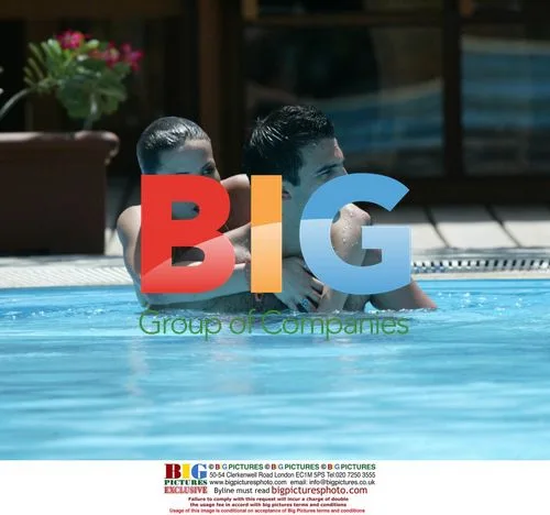 Sophie Anderton and boyfriend play in pool