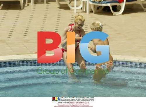 Michelle Marsh and Jo Hicks by the Pool