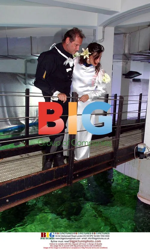 Underwater Wedding in Shark Pool