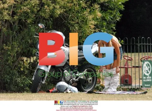 Louise Brady Doing Yoga on Motorcycle