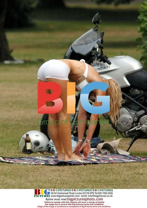Louise Brady does yoga on her motorbike