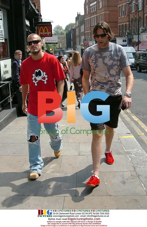 Footballer Freddie Ljunberg and Arsenal Goalkeeper Rami Shaaban Shopping