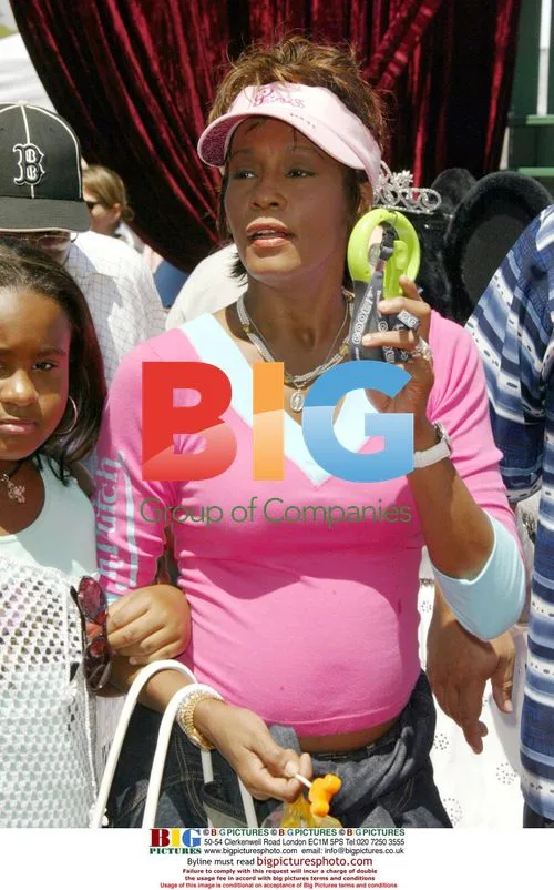Whitney Houston and daughter at Disney premiere