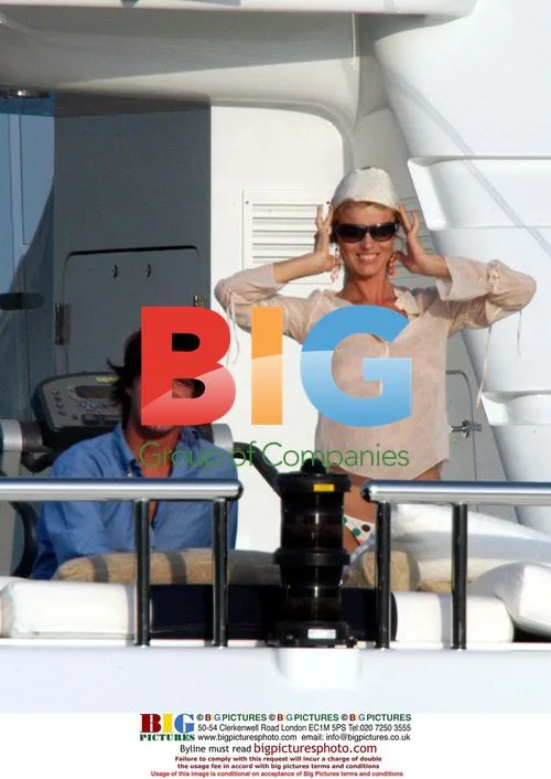 Supermodel Eva Herzigova enjoys summer fun with Flavio Briattore