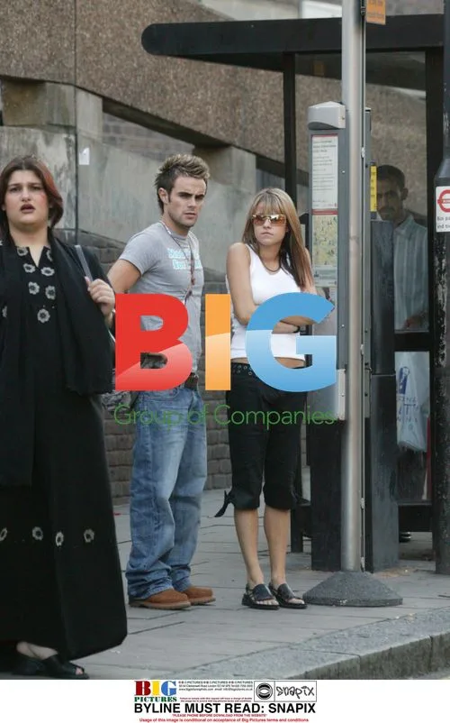 Pop star Dane Guiden with girlfriend on bus