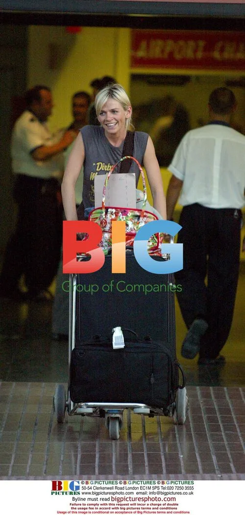 Zoe Ball and friends leaving airport in Spain