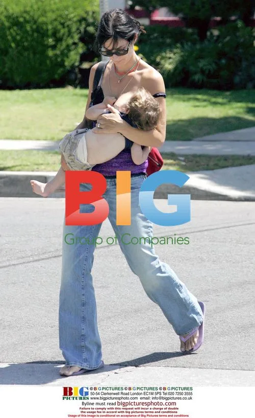 Carrie Ann Moss Visits Mall with Family