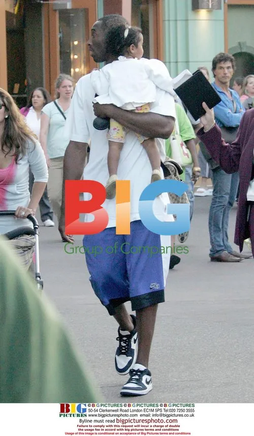Kobe Bryant at Disneyland with Family