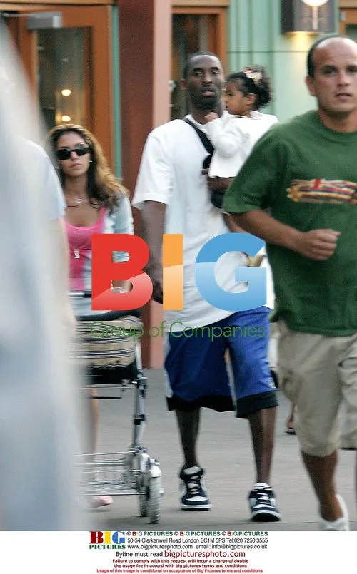 Kobe Bryant at Disneyland with Family