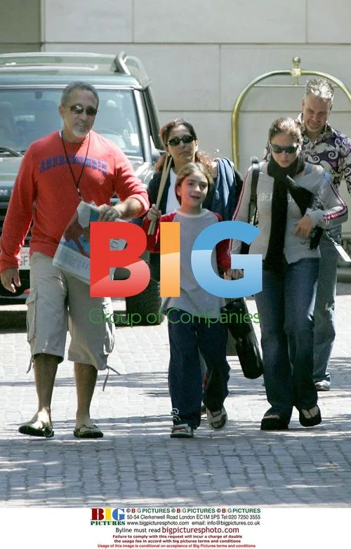 Gloria Esterfan and family leaving hotel