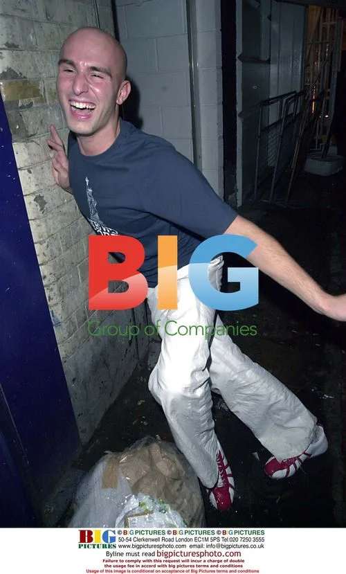 Marco Sabba jumps into bins at Big Brother party