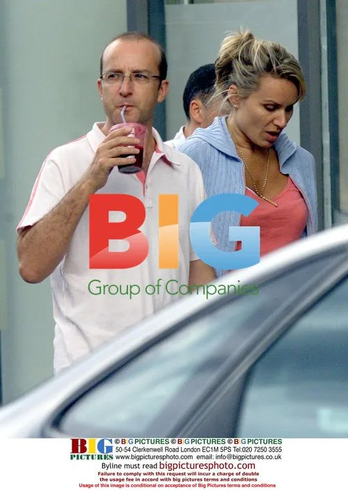 Paul McKenna with partner in Notting Hill